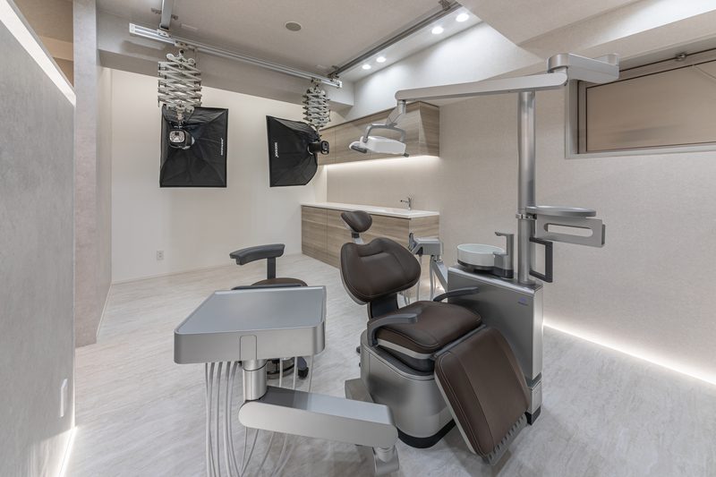 Modern treatment room with professional photography equipment